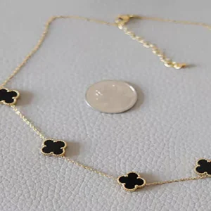 5 cloverr Elegant gold clover necklace with black clover accents for daily wear