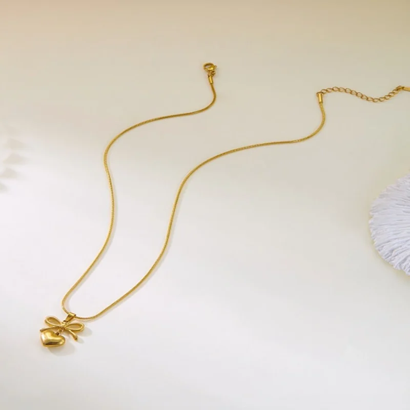 bow haert1 gold bow heart pendant necklace stainless steel daily wear