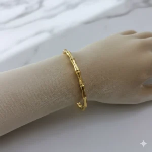 Cartier Bamboo Hand Cuff Gold Bracelet on Wrist – Zbish Jewels