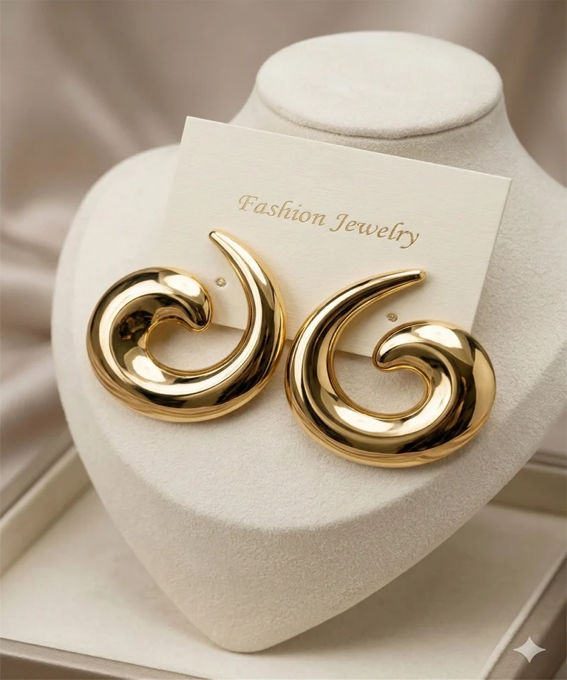 ear12 Veloura swirl gold statement earrings modern sculpted luxury earrings for women
